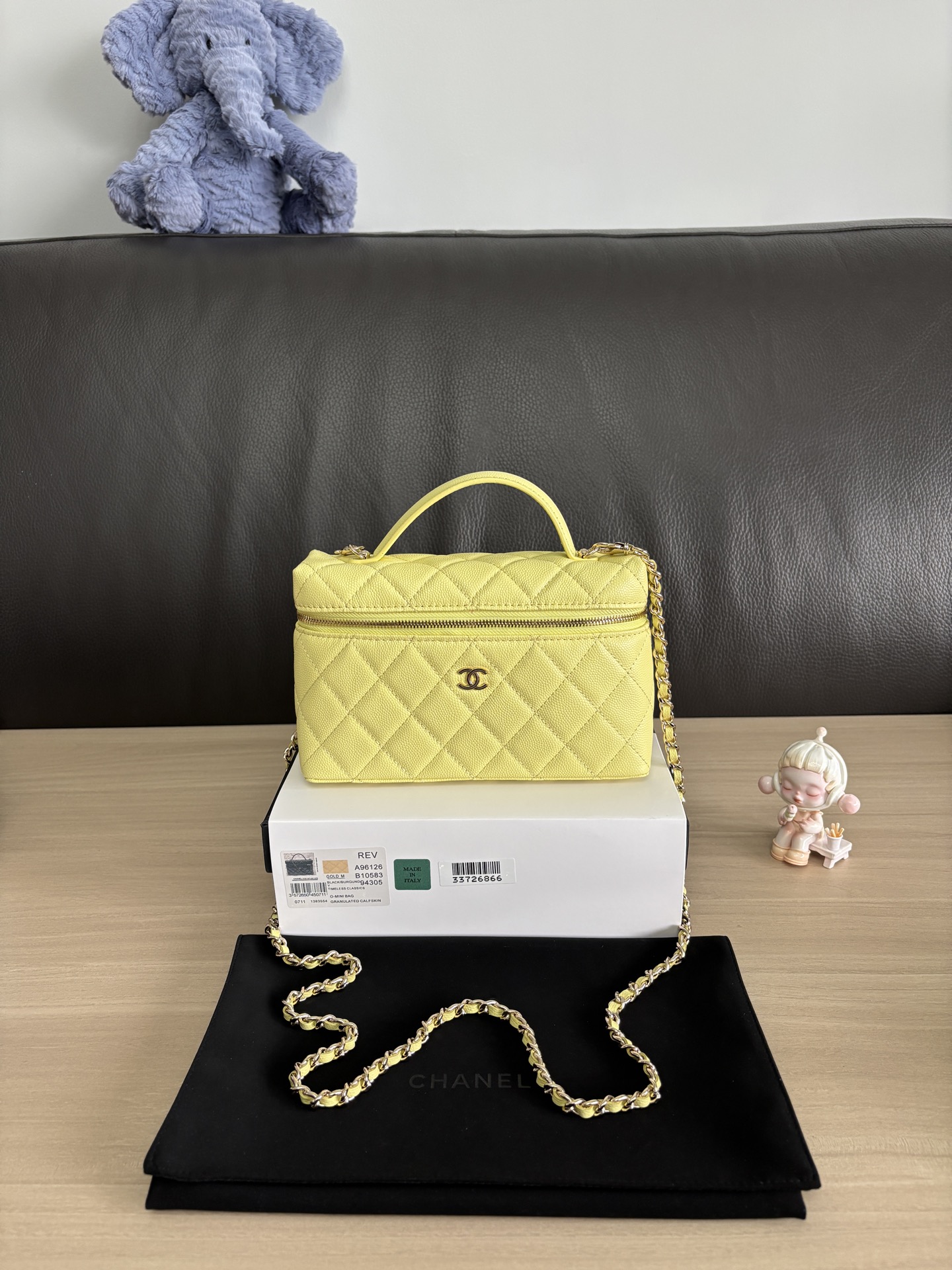 Chanel Quilted Vanity Case Bag with Top Handle and Chain Strap 2 i1749100819485 3566 0 0