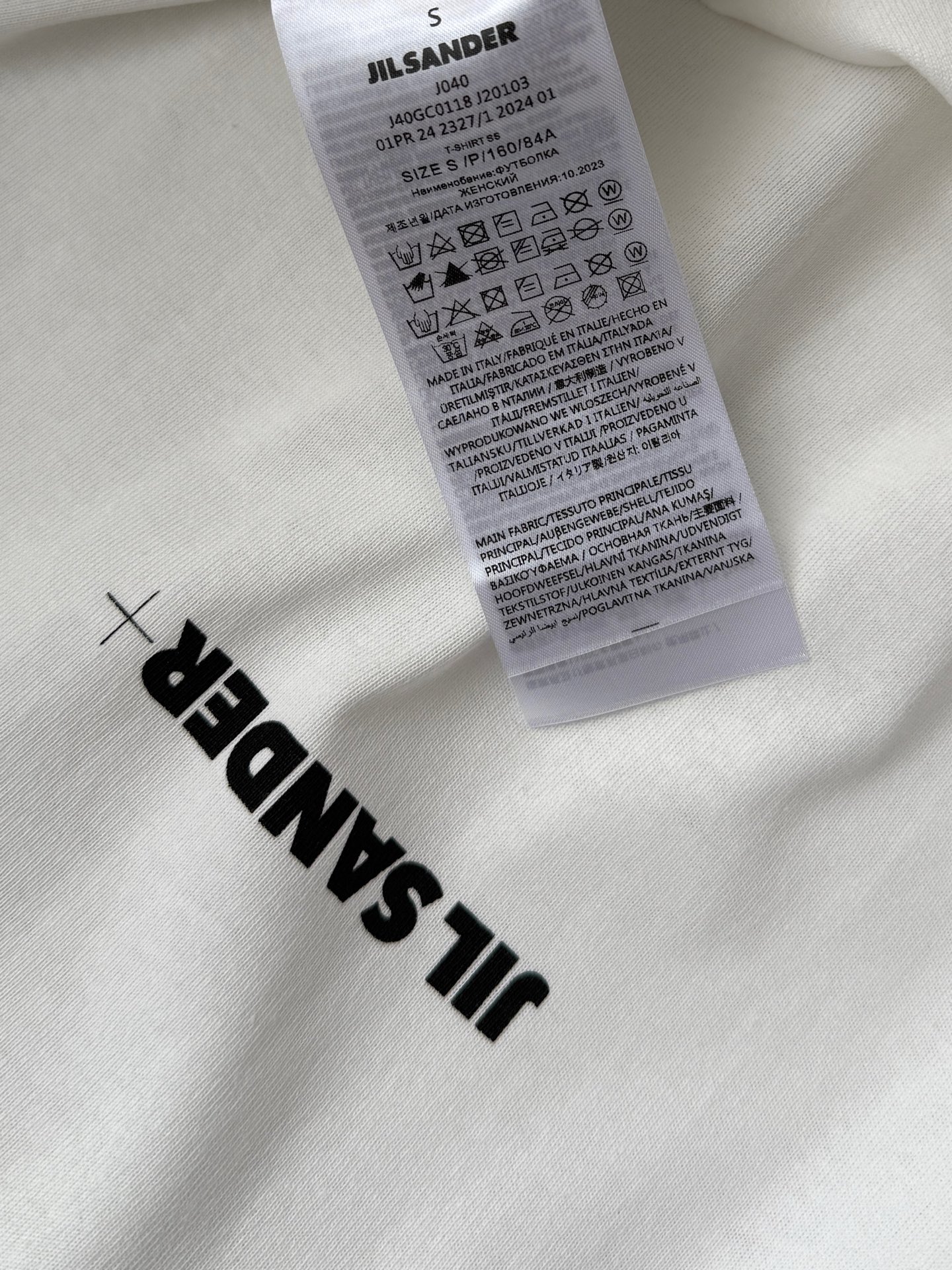 “Original Hard-core Female Suit: Quality and Cash-packed Summer Staple in White” - 图片 8