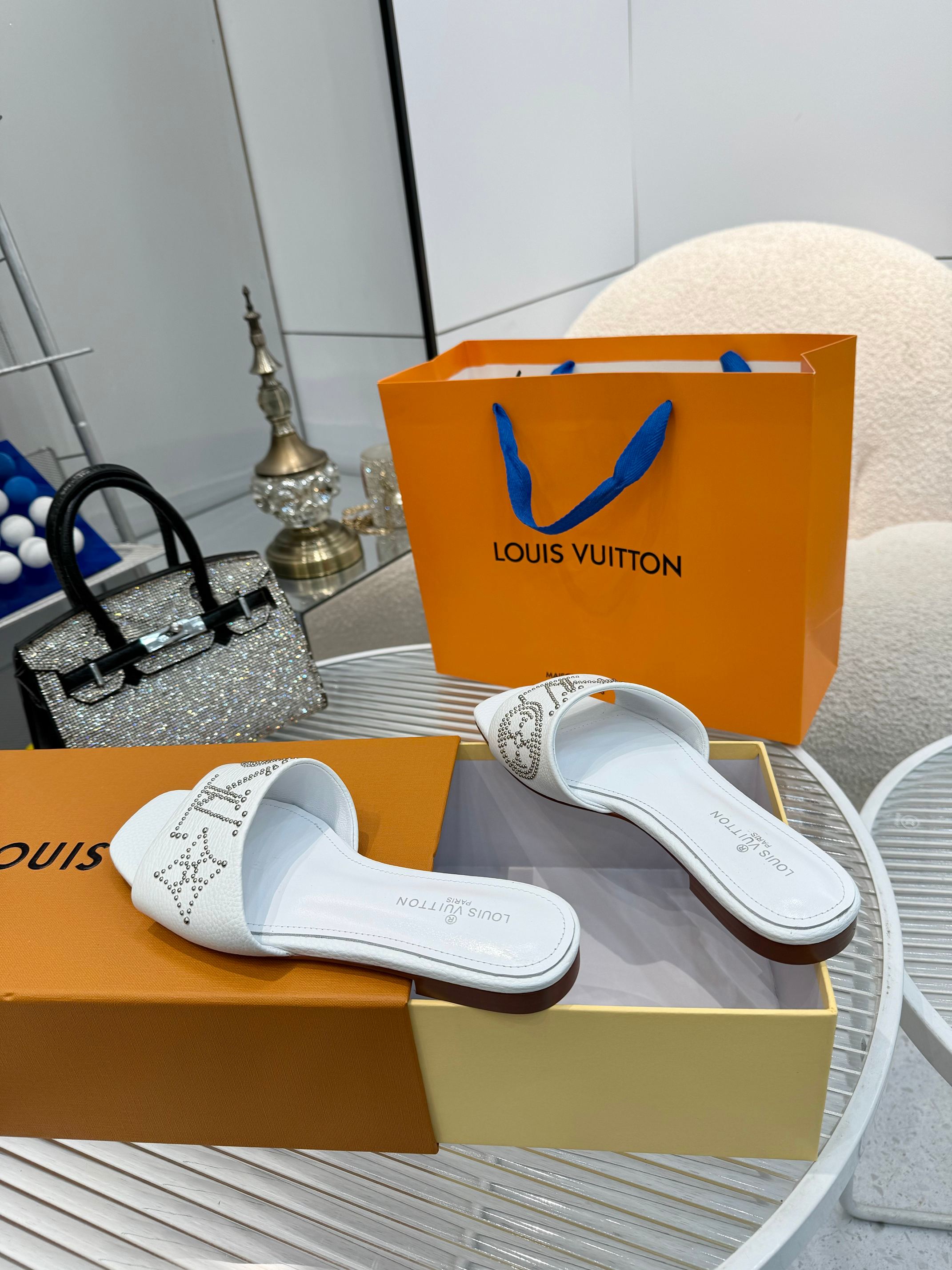 Louis Vuitton Women's White Leather Studded Logo Flat Sandals Slides 5 a1742621354098 7514