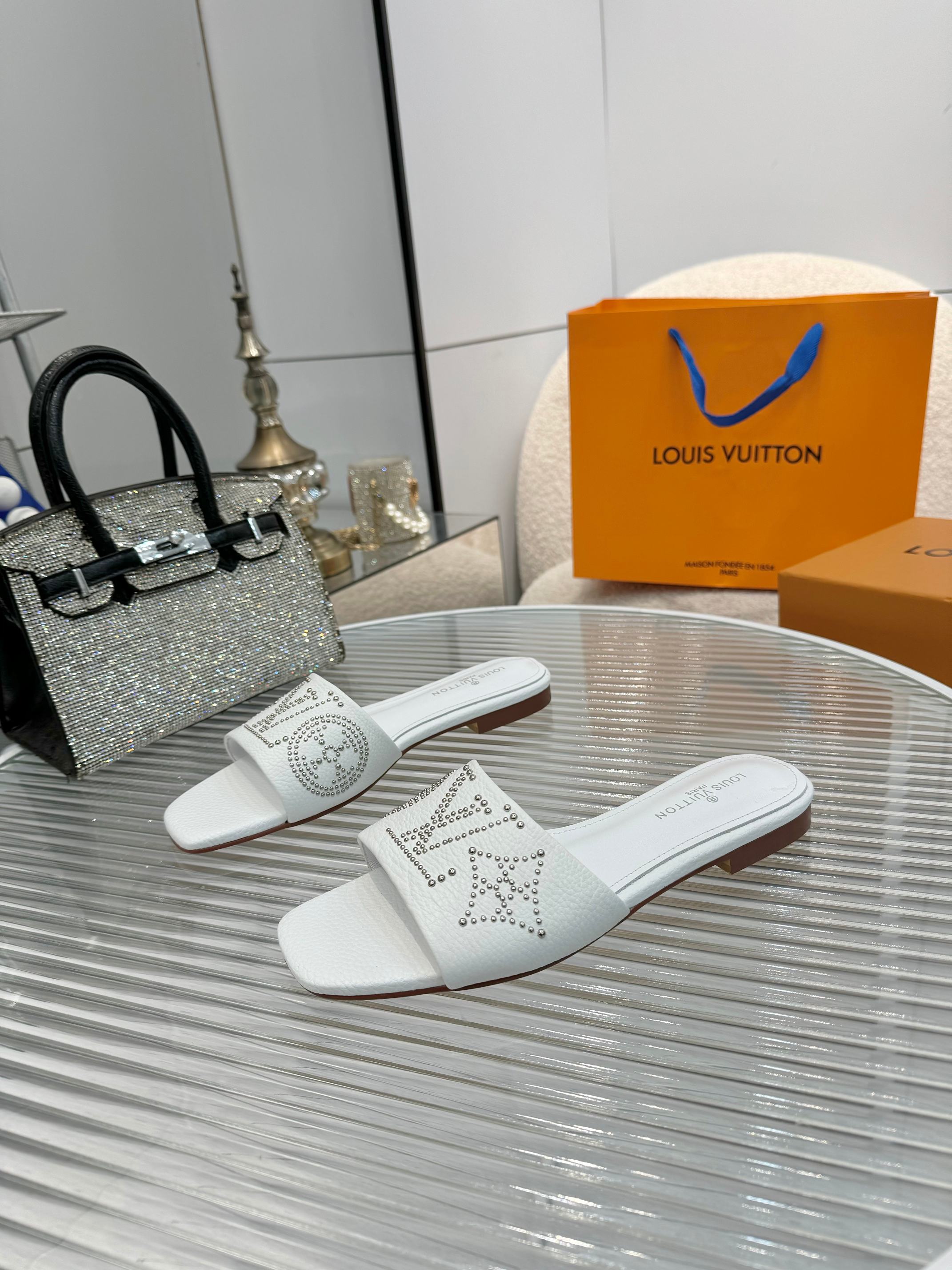 Louis Vuitton Women's White Leather Studded Logo Flat Sandals Slides 3 a1742621358654 8845