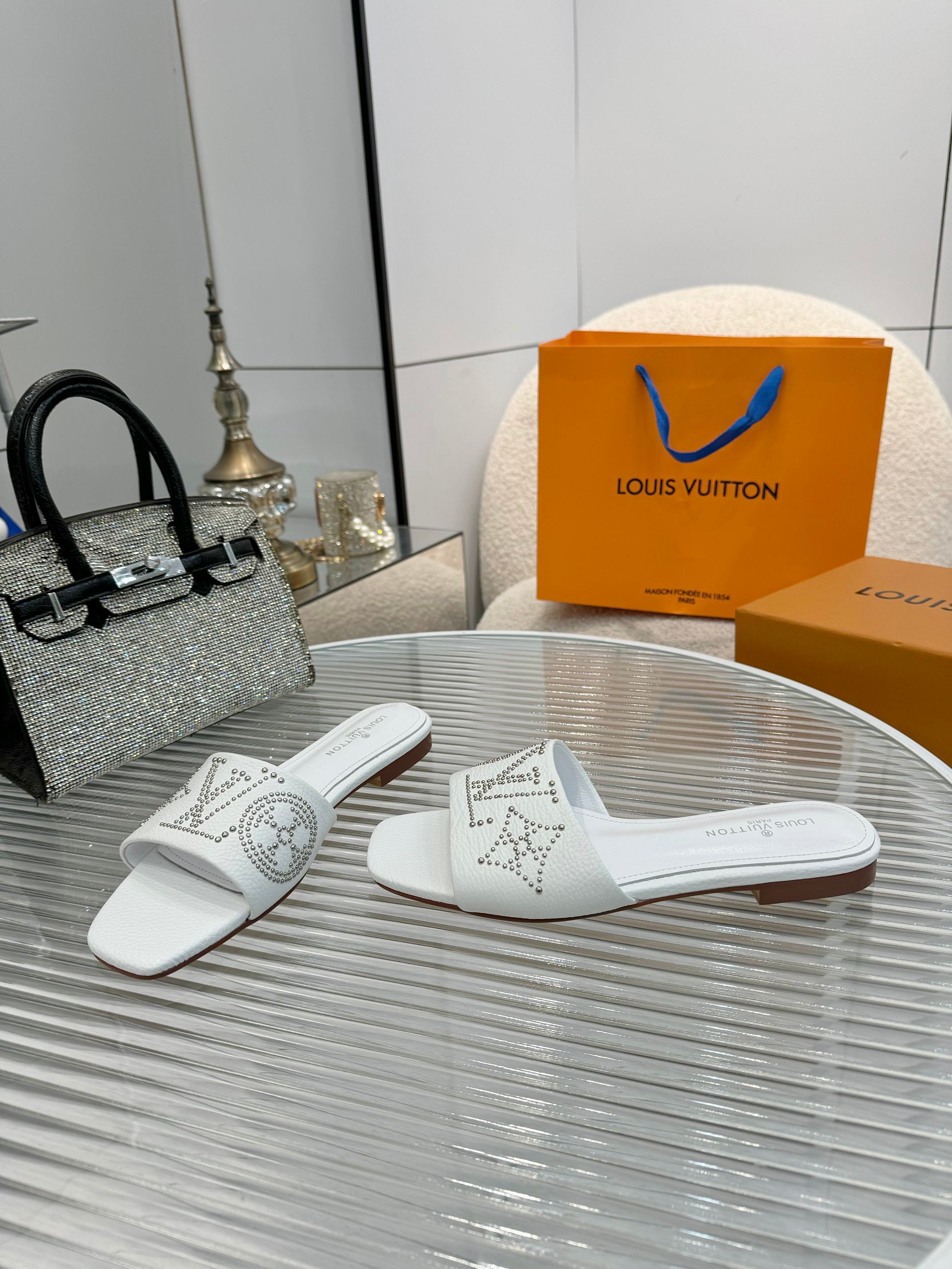 Louis Vuitton Women's White Leather Studded Logo Flat Sandals Slides 9 a1742621358665 8151