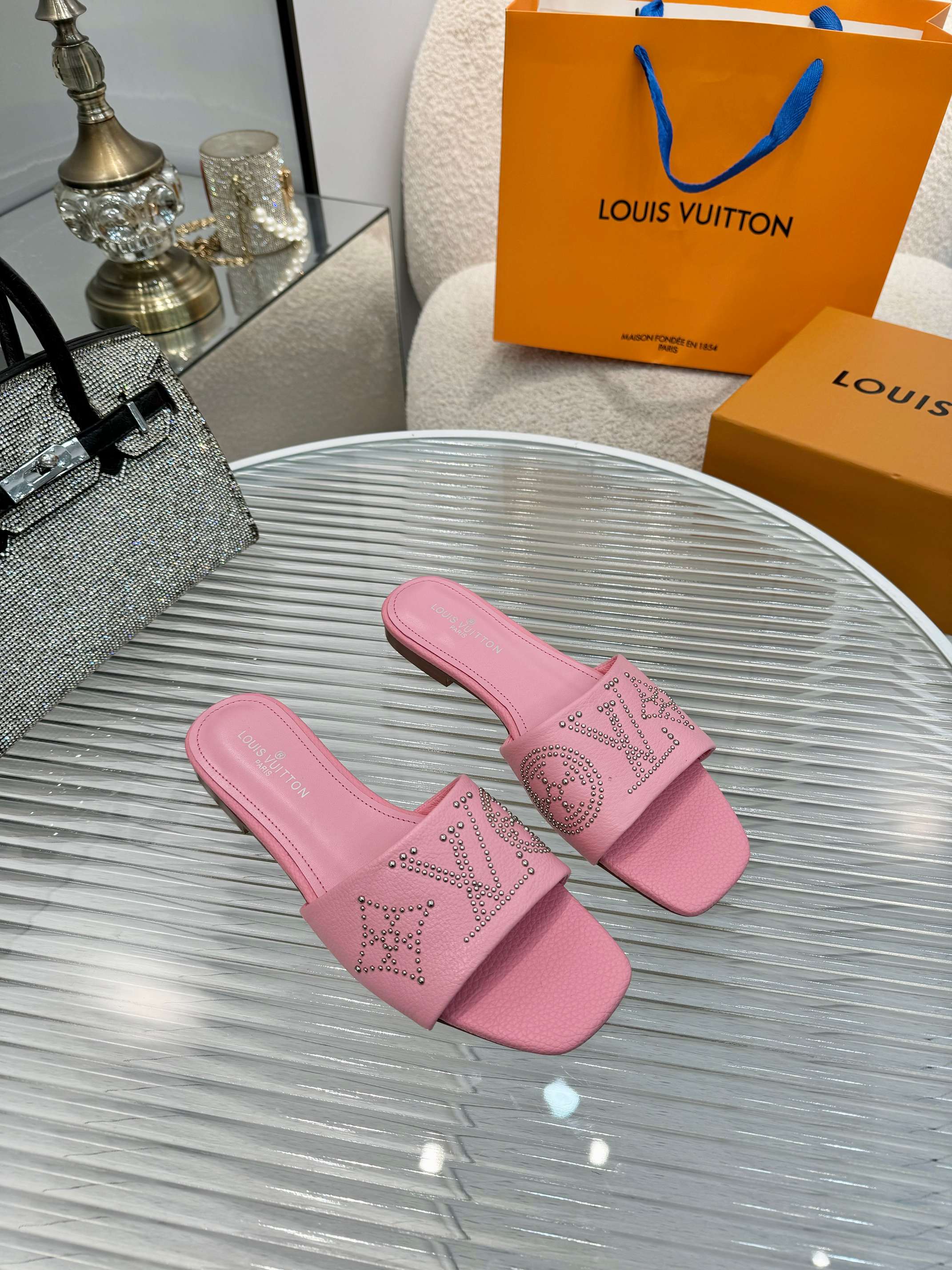 Louis Vuitton Women's Pink Leather Rivoli Sandal with Iconic LV Signature 1 Louis Vuitton Women's Pink Leather Rivoli Sandal with Iconic LV Signature