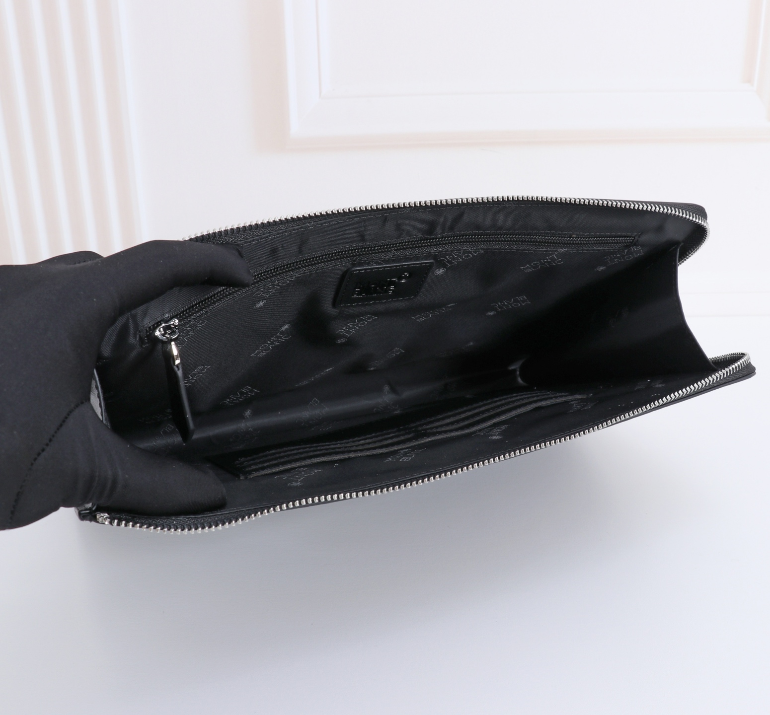 MONTBLANC 全新万宝龙匠心系列大号手夹包   经典黑型号：MB#材质：牛皮款式：万宝龙专柜购版打