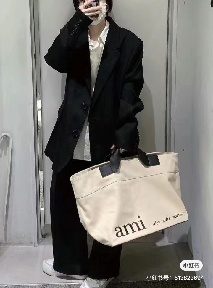 AMI canvas tote bag featuring a spacious interior and lightweight - Comprehensive