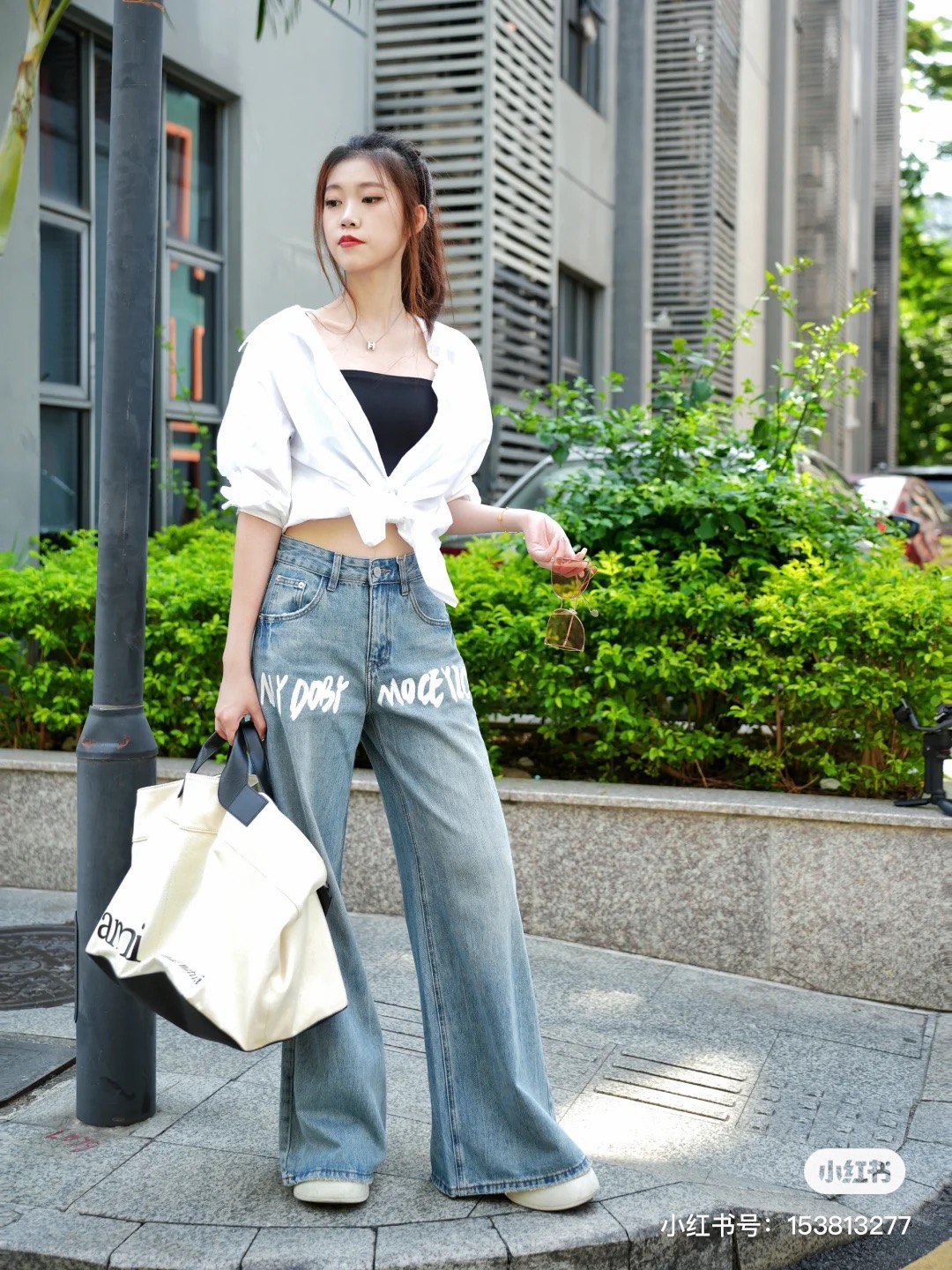 A versatile, minimalist AMI handbag presented in soft off-white - Comprehensive 9