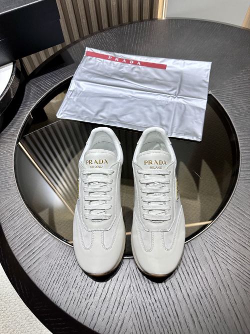 Prada Suede Low-Top Sneakers Casual Versatile with Enamelled Metal Triangle Logo 1 Prada Suede Low-Top Sneakers Casual Versatile with Enamelled Metal Triangle Logo