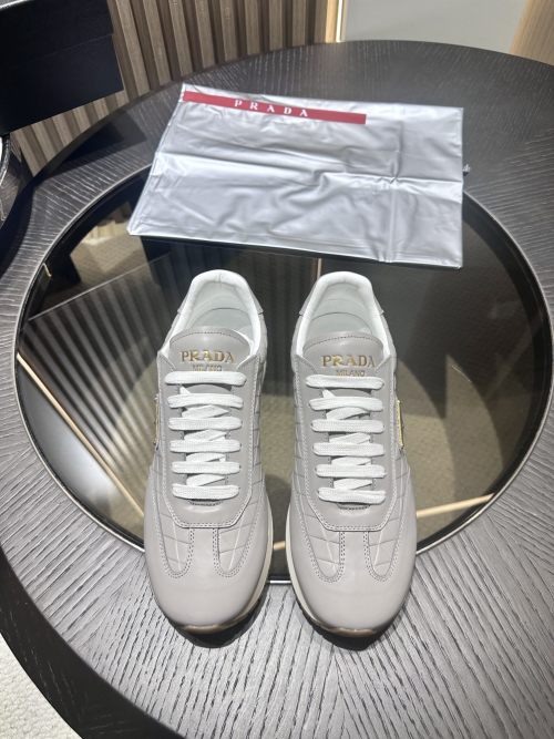 Prada Leather Sneakers with Embossed Logo - Versatile & Comfortable Shoes 1 Prada Leather Sneakers with Embossed Logo - Versatile & Comfortable Shoes