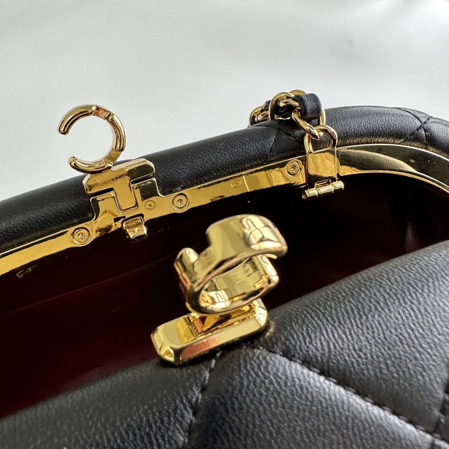 Chanel Quilted Leather Clutch With CC Kiss Lock
