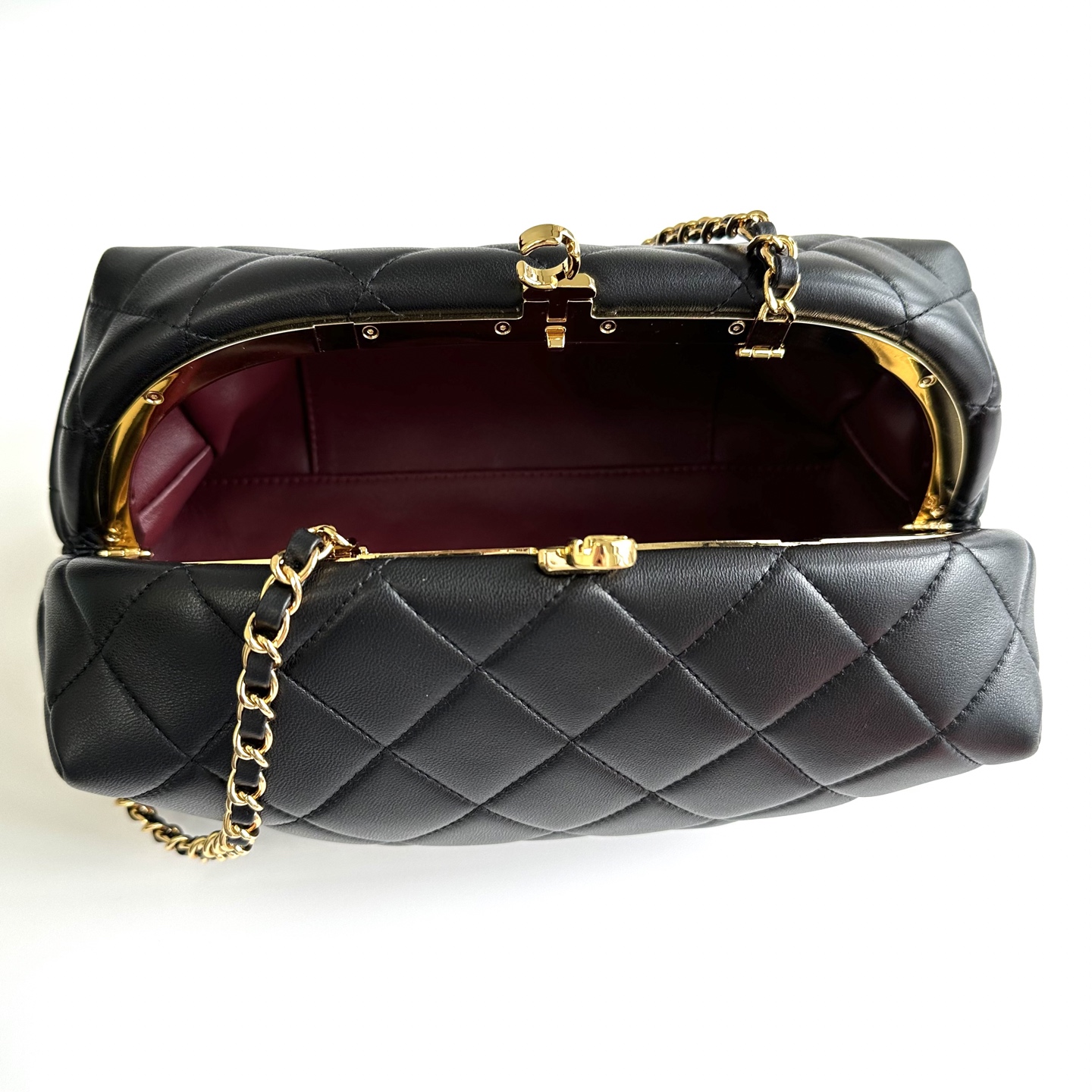 Chanel Quilted Leather Clutch With CC Kiss Lock
