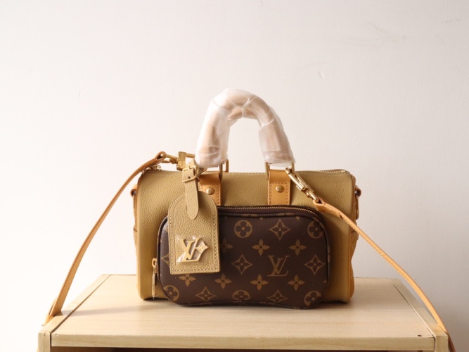 Louis Vuitton Keepall Bandouliere 25: Grained Leather, Suede Details, Monogram Canvas 1 Louis Vuitton Keepall Bandouliere 25: Grained Leather, Suede Details, Monogram Canvas