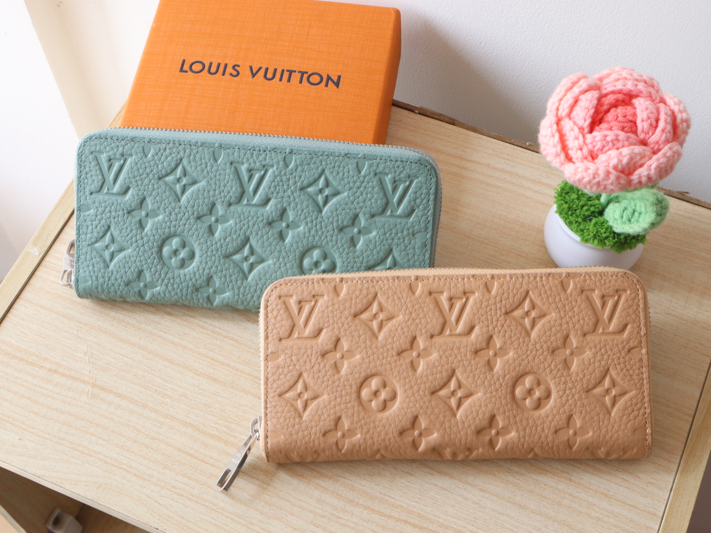 Louis Vuitton Taurillon Leather Multiple Wallet with Monogram Embossed Design