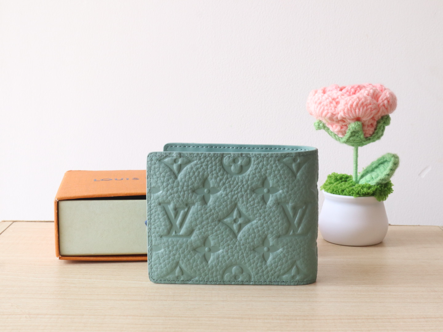 Louis Vuitton Taurillon Leather Multiple Wallet - Compact & Stylish 2 i1742793509632 3995 0 1