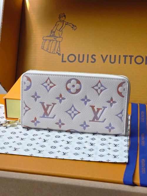 Louis Vuitton Monogram Empreinte Leather Zippy Wallet - M25594