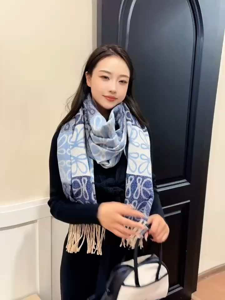 the Loewe-style scarf in Nile Blue brings effortless elegance to any - Comprehensive