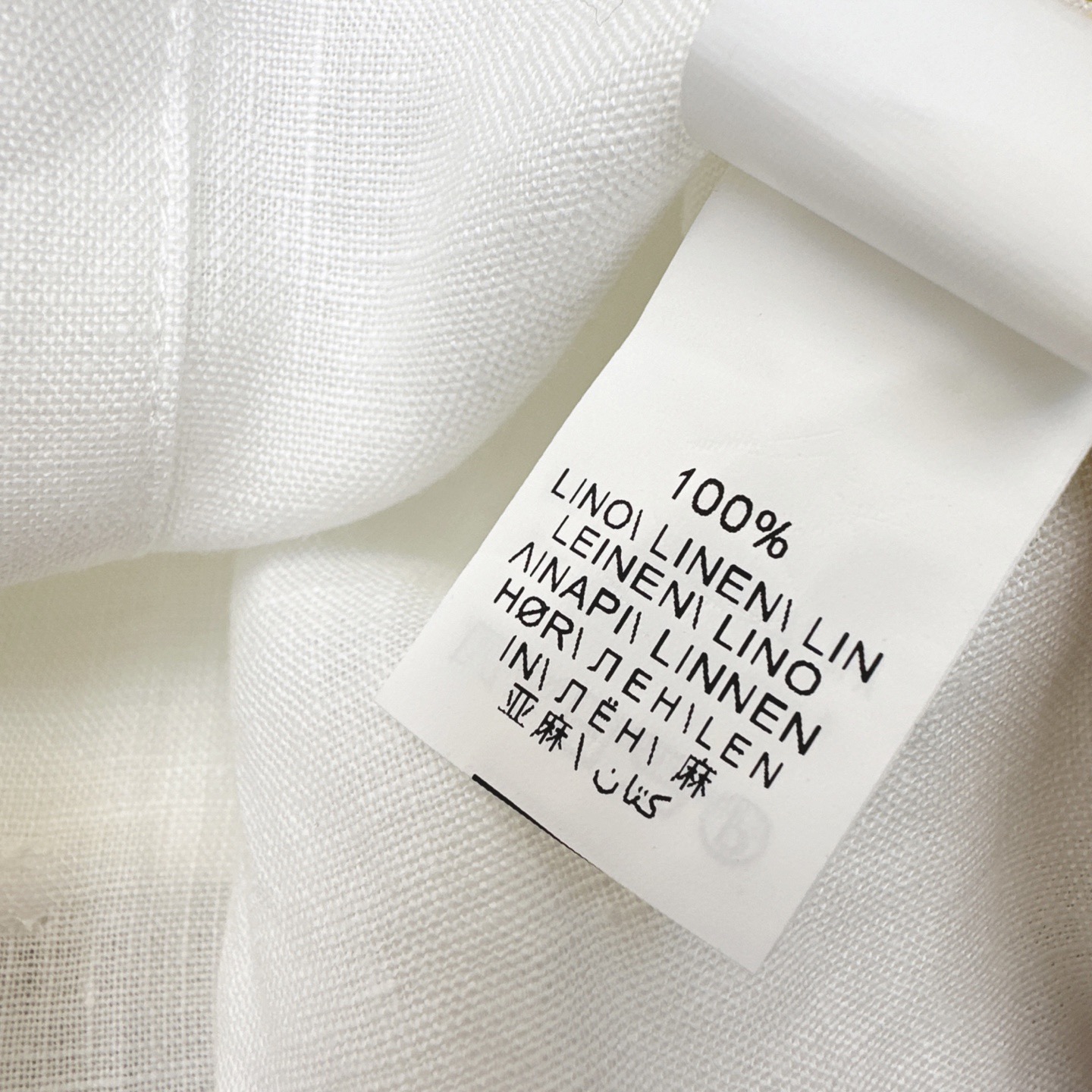 “Stylish Linen Line for Women: Short-Sleeved Shirts with Large Shoulder Sleeves” - 图片 9