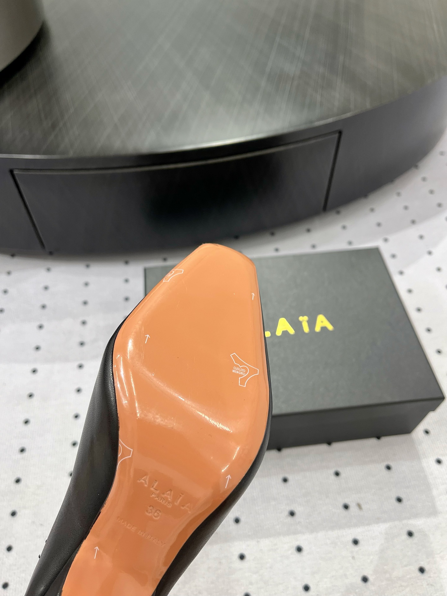 Alaïa Elegant Leather Heeled Mules with Golden Embellishment 6 i1717061277 3985 2