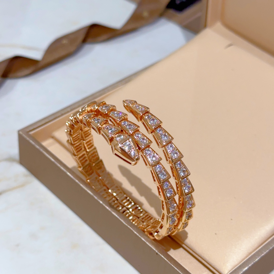 Luxurious Serpenti Viper Bracelet in V Gold with Diamonds Exudes Elegance.