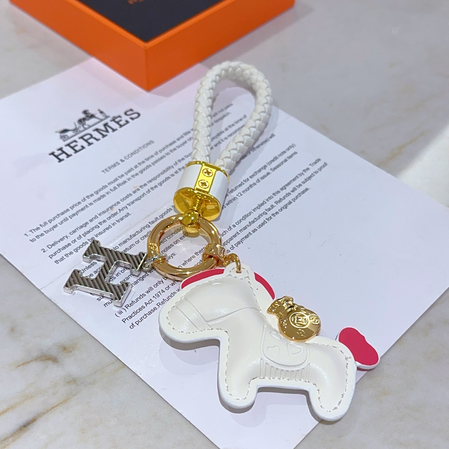 Luxurious Hermes Key Button in Platinum: Customized Male and Female Designs - 图片 2