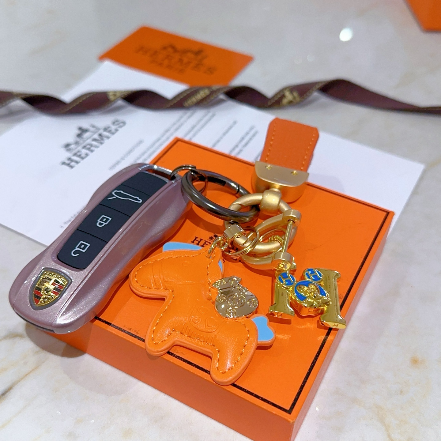 Luxurious Custom Hermes Key Button with Platinum Detailing: Masterfully Crafted for Elegance - 图片 1