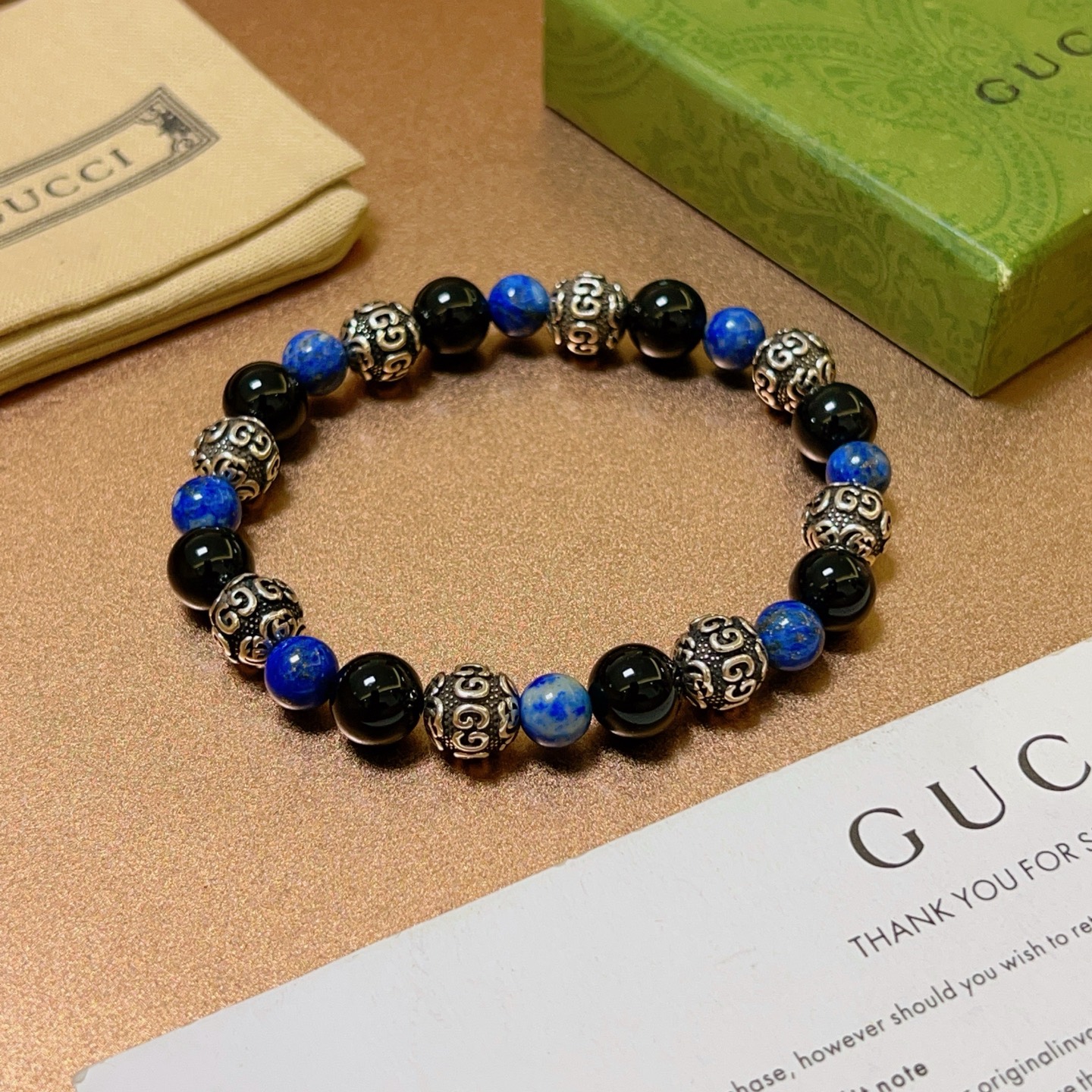 NO:112095,Buy Gucci bracelets are the same as men and women. The latest model of natural black agate with lapis lazuli bracelets has higher grades. Stars are the same as Anger Forest series double g black agate crystal bracelet. Size: 16-24 cm. Details are used to treat the old version. Non-market bright version. This model is always available on the market. Gucci is popular in the hot-selling model. Very easy to match clothes, fine accessories, gucci, bracelet19860909批 古驰手链男女同款 最新款天然黑玛瑙搭配青金石手链档次更高明星同款Anger Forest系列双g黑玛瑙水晶手链 尺寸:16-24厘米 细节对版做旧处理 非市面亮面版型 非市面普通做这款一直在出 古驰里面热卖款 非常好搭配衣服,饰品精品,gucci,bracelet,Jewelry