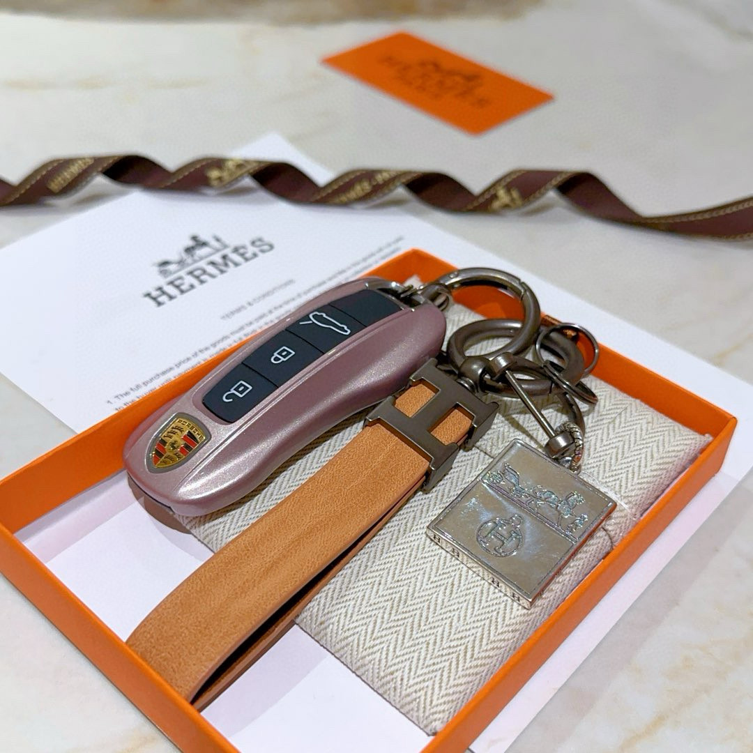 Ciondolo portachiavi in pelle Hermes H Logo Pelle marrone chiaro canna di fucile metallo argento 12 cm