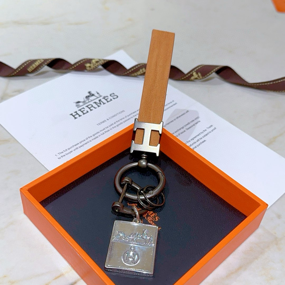 Ciondolo portachiavi in pelle Hermes H Logo Pelle marrone chiaro canna di fucile metallo argento 12 cm