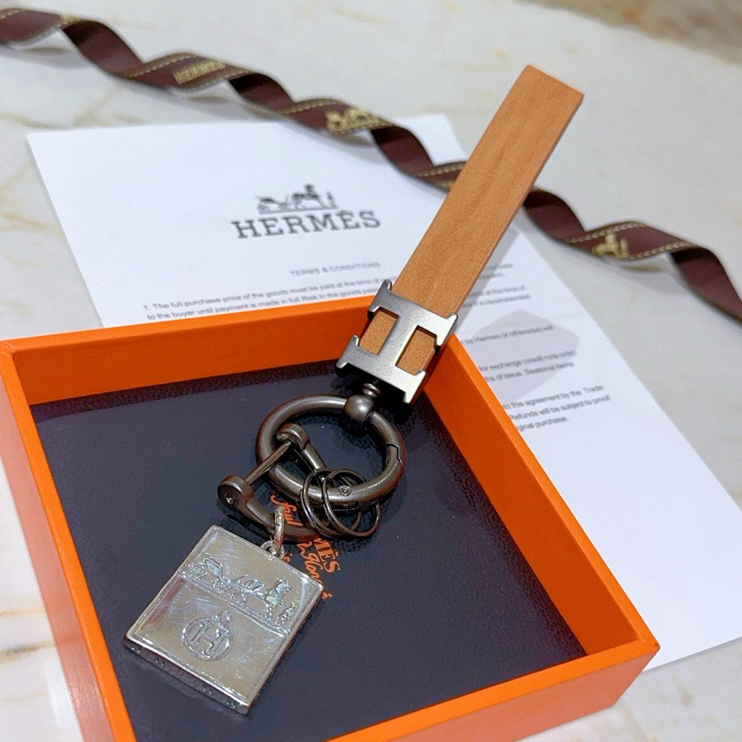 Ciondolo portachiavi in pelle Hermes H Logo Pelle marrone chiaro canna di fucile metallo argento 12 cm
