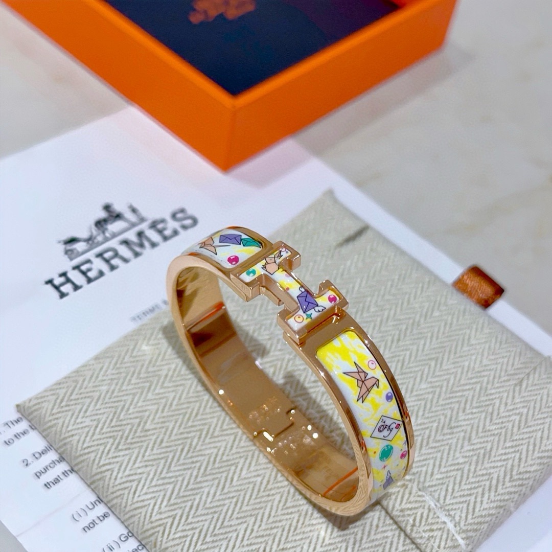 Pulseira Hermes Clic H Metal banhado a ouro rosa com esmalte branco e amarelo com estampa de origami multicolor PM