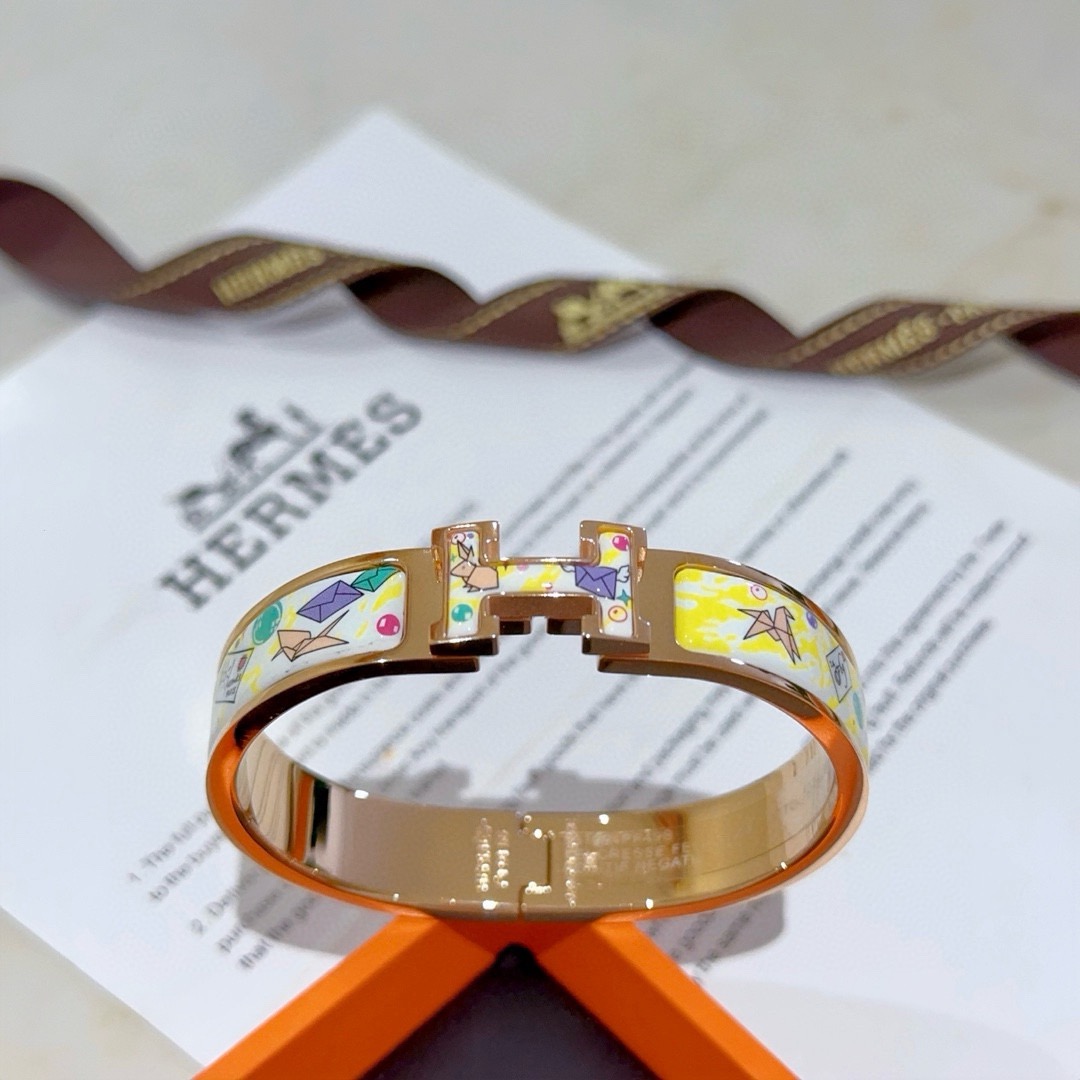 Pulseira Hermes Clic H Metal banhado a ouro rosa com esmalte branco e amarelo com estampa de origami multicolor PM