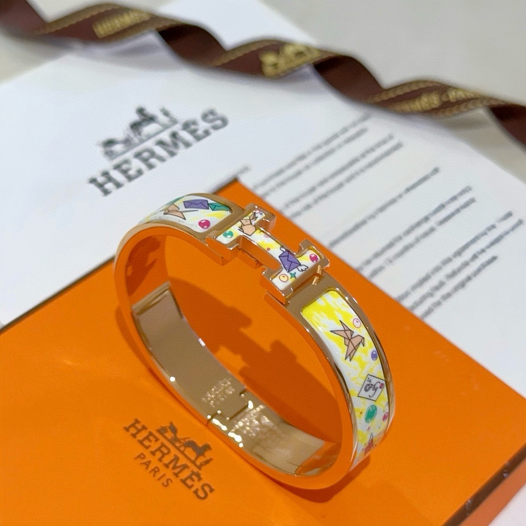 Pulseira Hermes Clic H Metal banhado a ouro rosa com esmalte branco e amarelo com estampa de origami multicolor PM