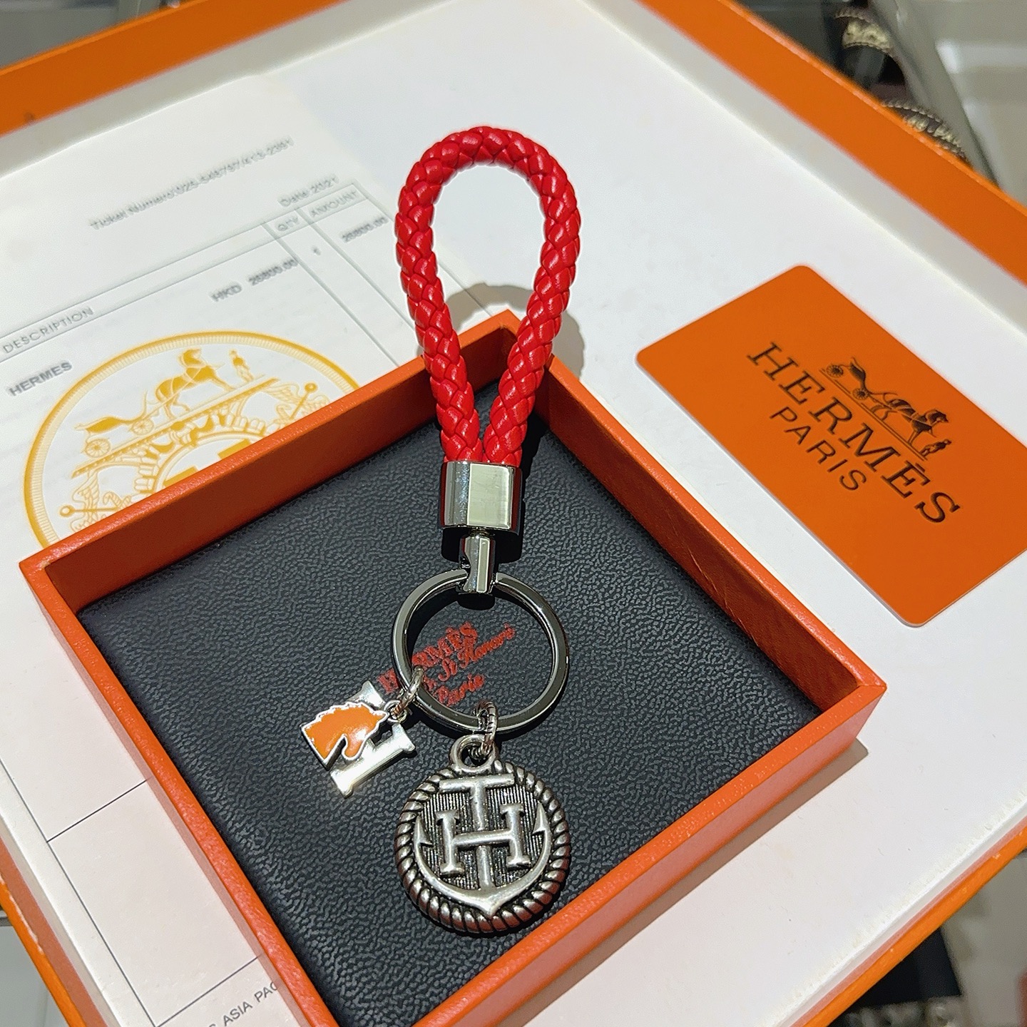 Hermes H Logo Anchor Braided Keychain pendant Red braided leather silver-tone metal orange enamel 10cm total length