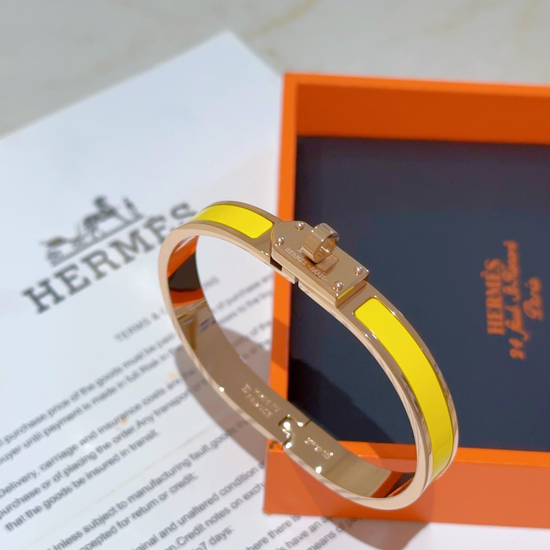 Hermes Kelly bracelet Rose gold metal with yellow enamel PM