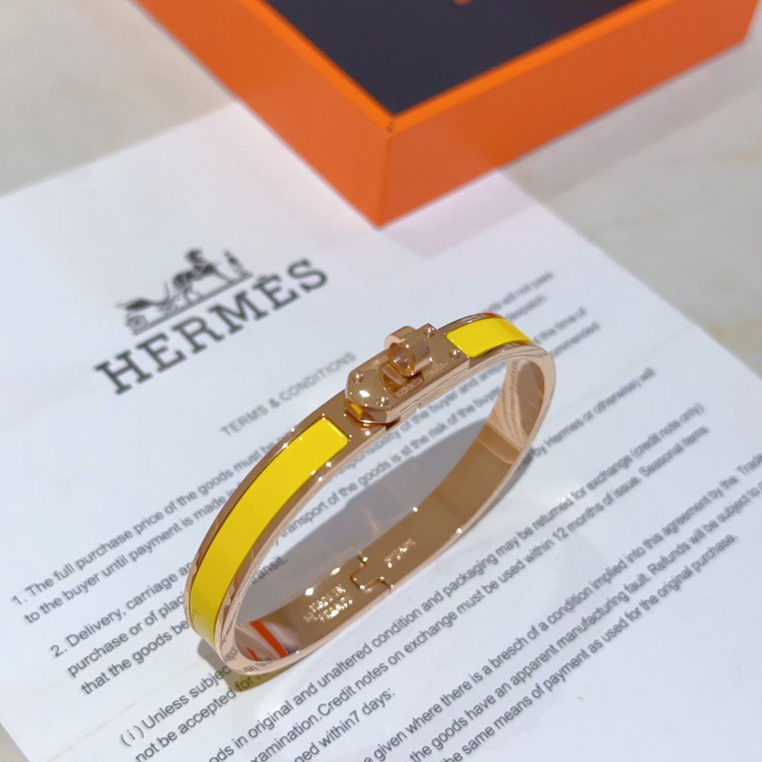 Hermes Kelly bracelet Rose gold metal with yellow enamel PM
