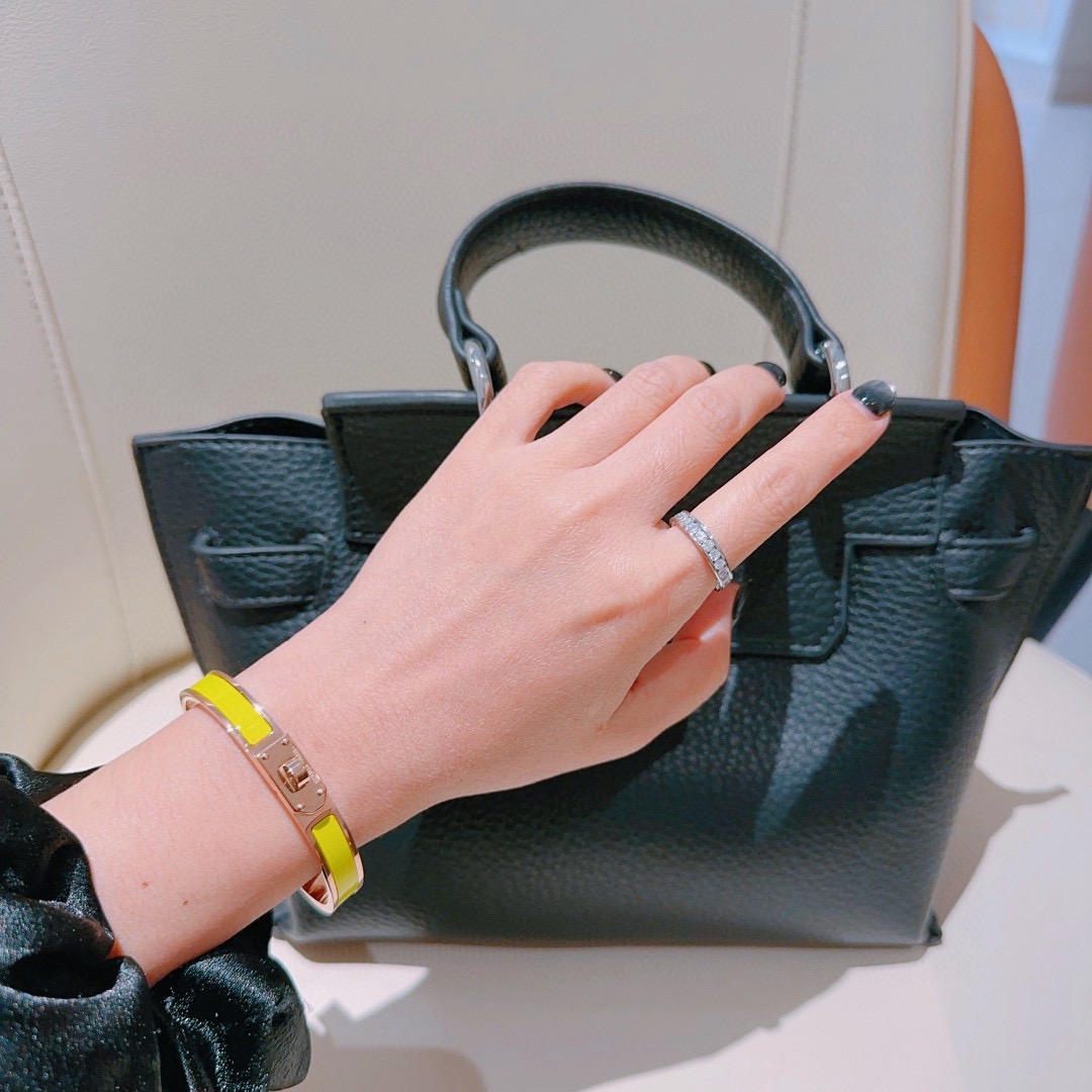 Bracelet Hermes Mini Clic Kelly Métal doré rose et émail jaune citron PM