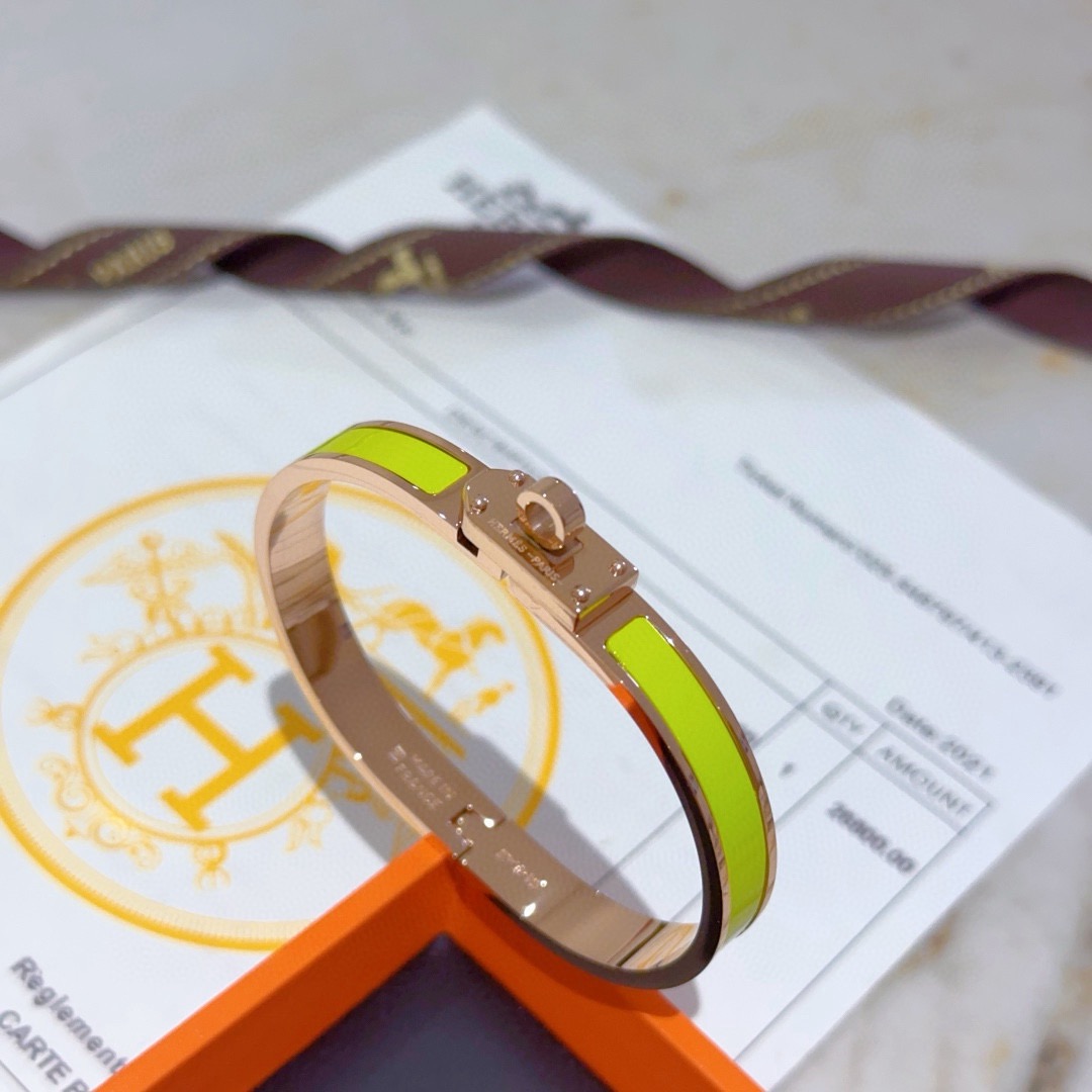 Bracelet Hermes Mini Clic Kelly Métal doré rose et émail jaune citron PM