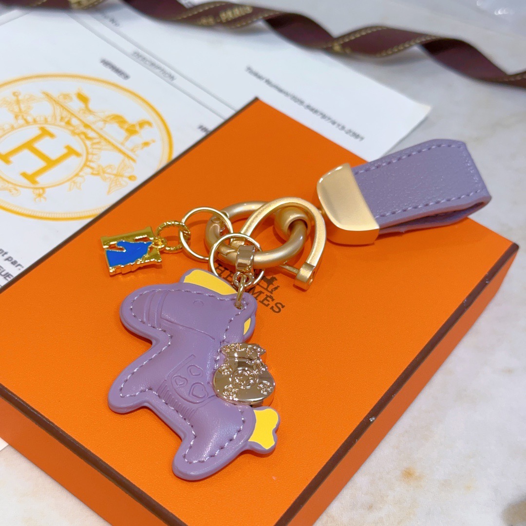 Hermes Rodeo Pony Charm Keychain pendant Lavender purple leather with gold tone metal yellow and blue enamel accents 10cm total length
