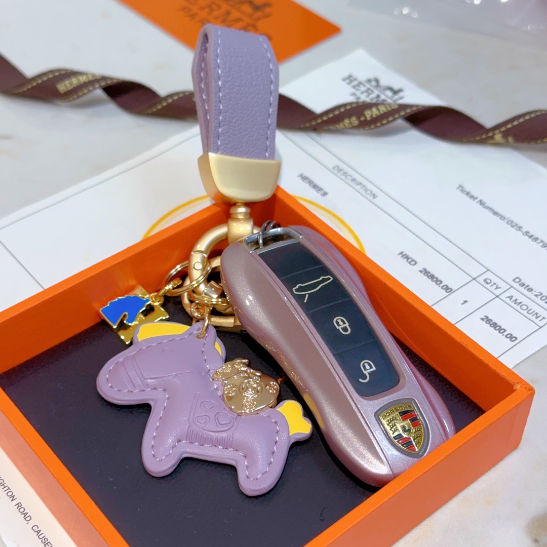 Hermes Rodeo Pony Charm Keychain pendant Lavender purple leather with gold tone metal yellow and blue enamel accents 10cm total length