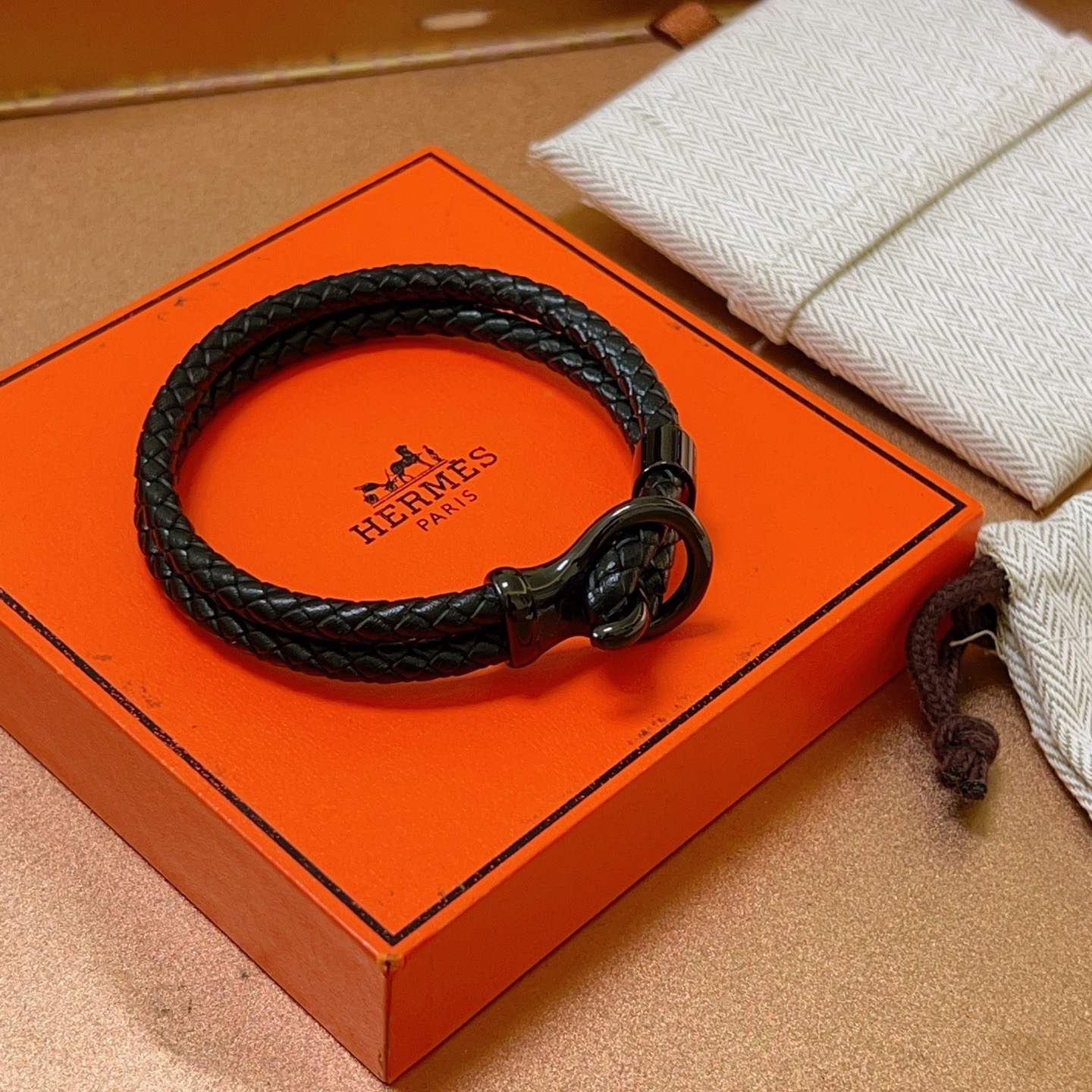 Hermes New H bracelet Black braided leather with gunmetal black hardware 19cm