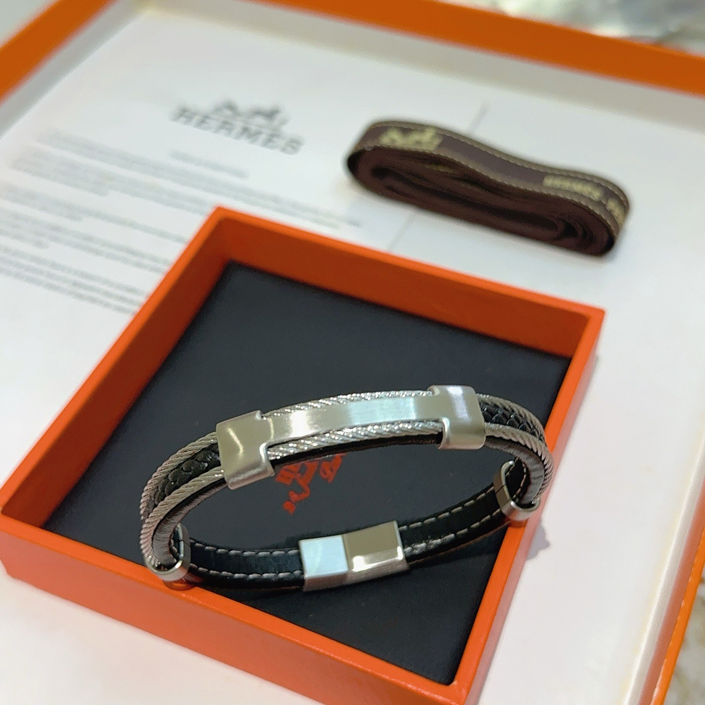 Hermes New Anger Forest bracelet Silver-toned metal with black braided leather 19cm