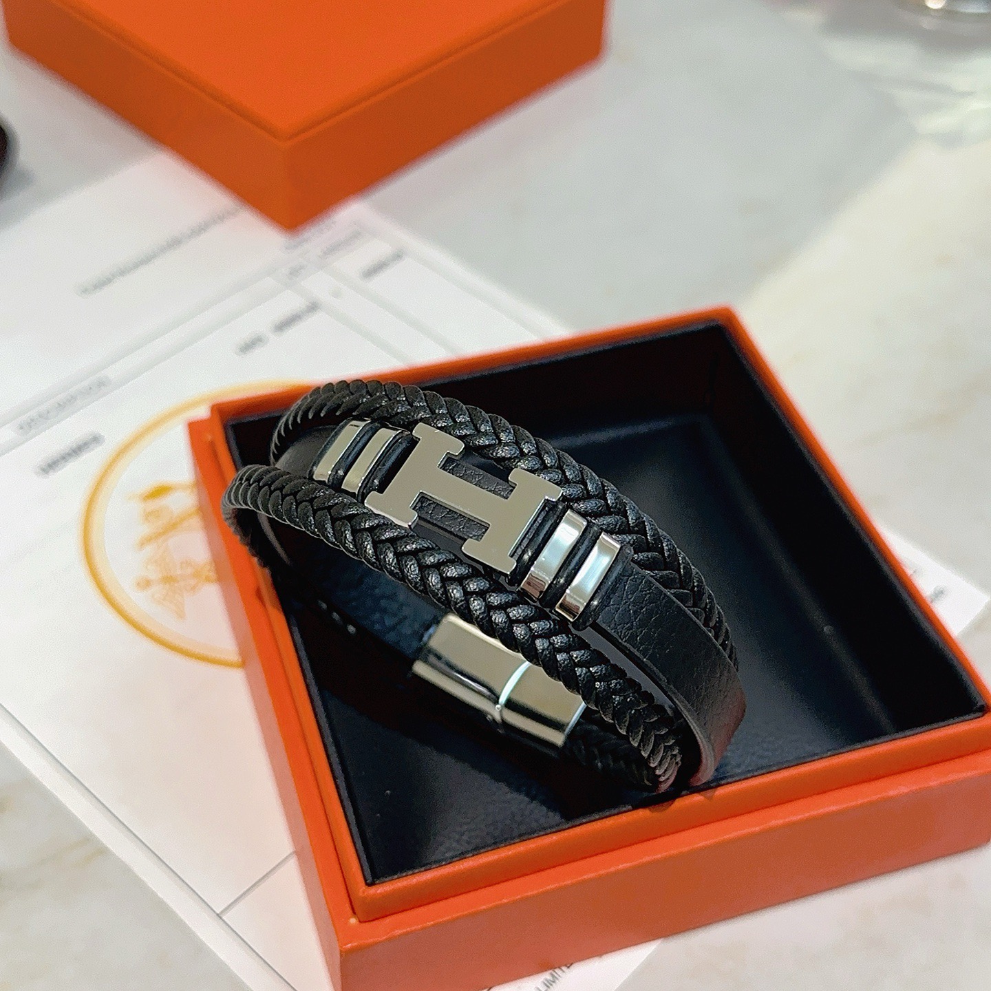 Hermes New Anger Forest H Logo Braided Leather Bracelet bracelet Black braided leather silver-tone palladium plated metal hardware 19cm