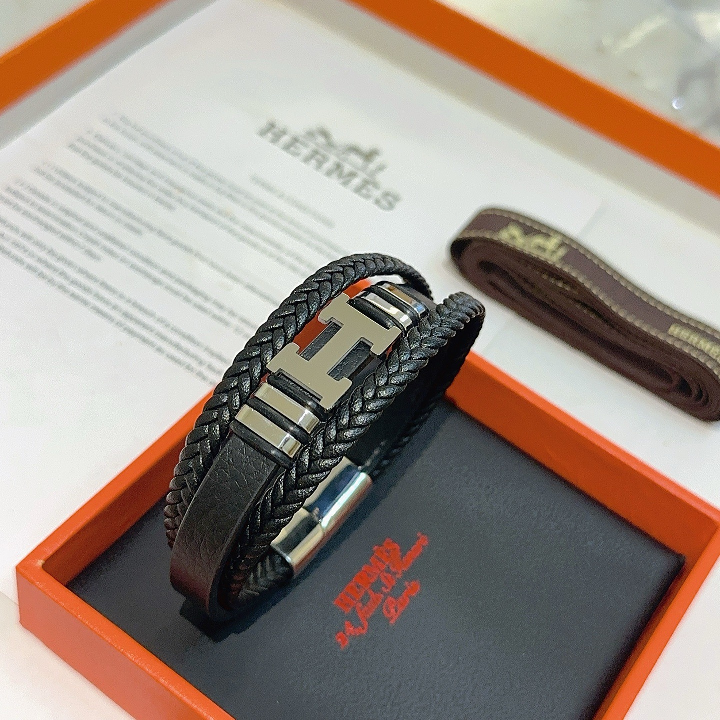 Hermes New Anger Forest H Logo Braided Leather Bracelet bracelet Black braided leather silver-tone palladium plated metal hardware 19cm