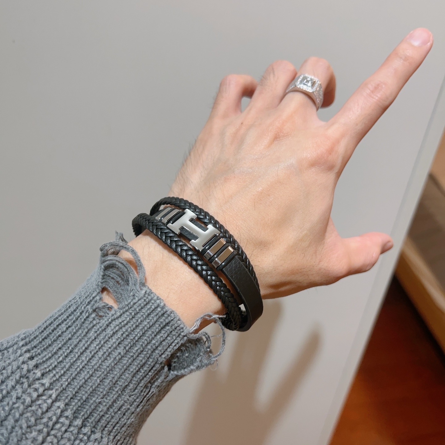 Bracelet en cuir tressé Hermes New Anger Forest H Logo Bracelet en cuir tressé noir Quincaillerie en métal plaqué palladium argenté 19 cm
