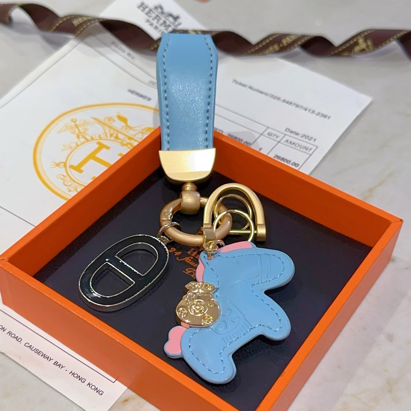 Hermes Rodeo Horse Charm Keychain pendant Light blue leather with pink accents matte gold hardware black and silver Chaine d Ancre charm 10cm total length
