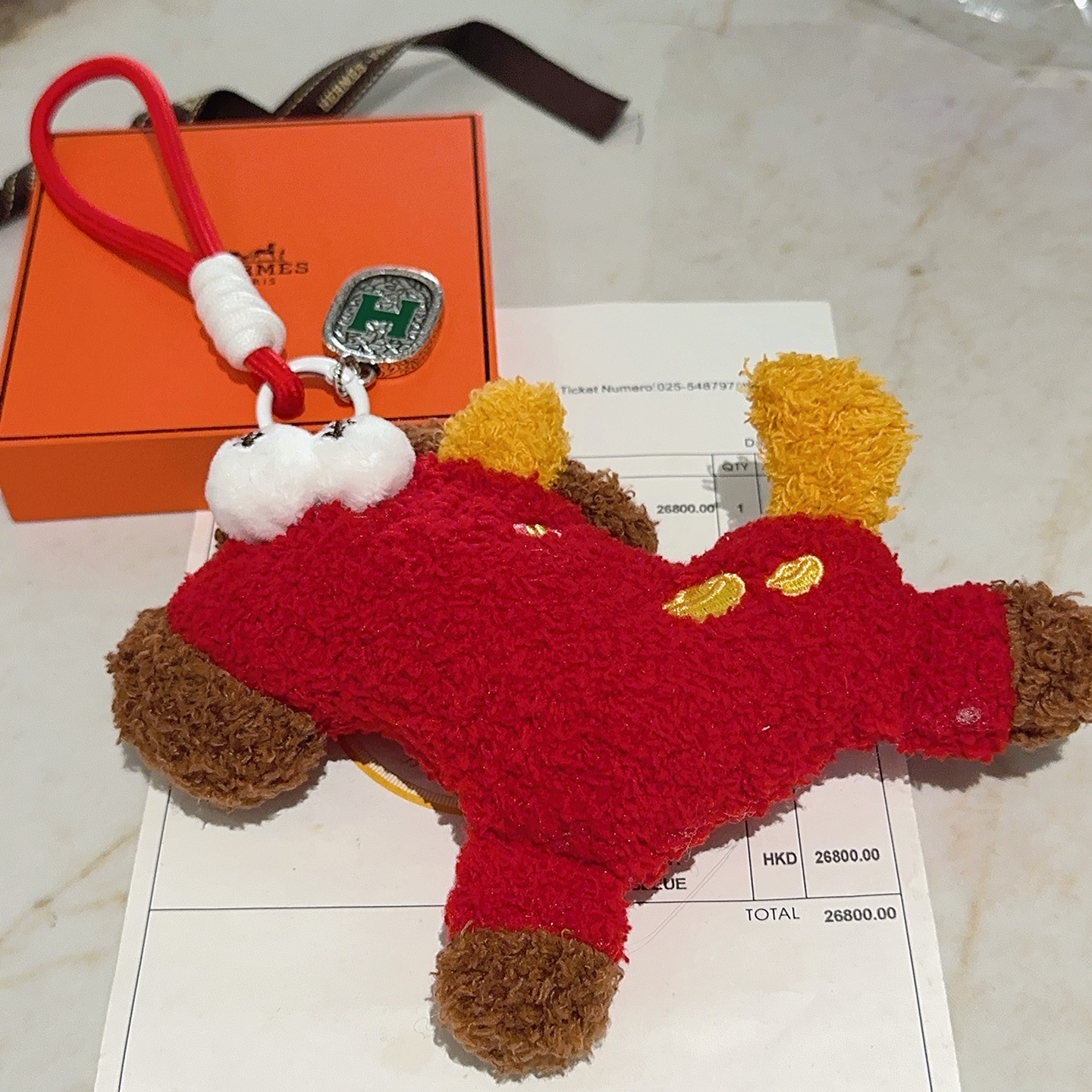 Hermes H Logo Plush Charm pendant Red plush with brown yellow white fabric accents silver-toned metal with green enamel H detail 12cm