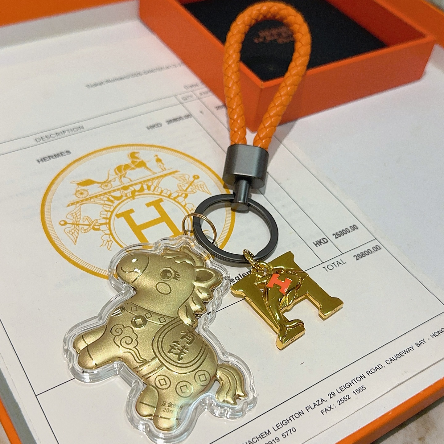 Hermes Lucky Horse H Logo Chaveiro Charme pingente Laranja couro trançado ferragens de metal dourado pingentes de metal com detalhes laranja H invólucro de acrílico transparente 10 cm alça trançada 4 cm