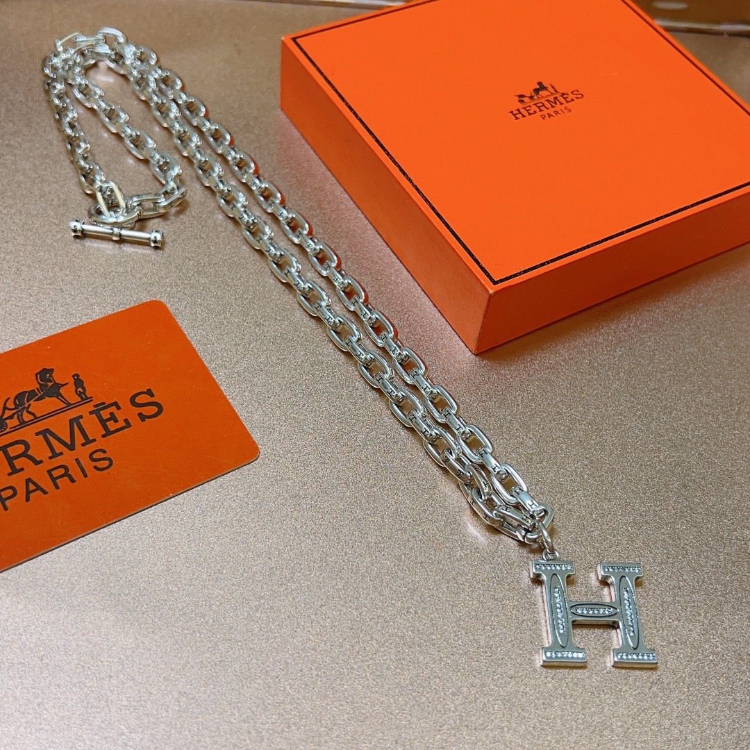 Hermes H Logo Pendant Chain necklace Silver-toned metal with clear diamond-like stone accents on H pendant 60cm