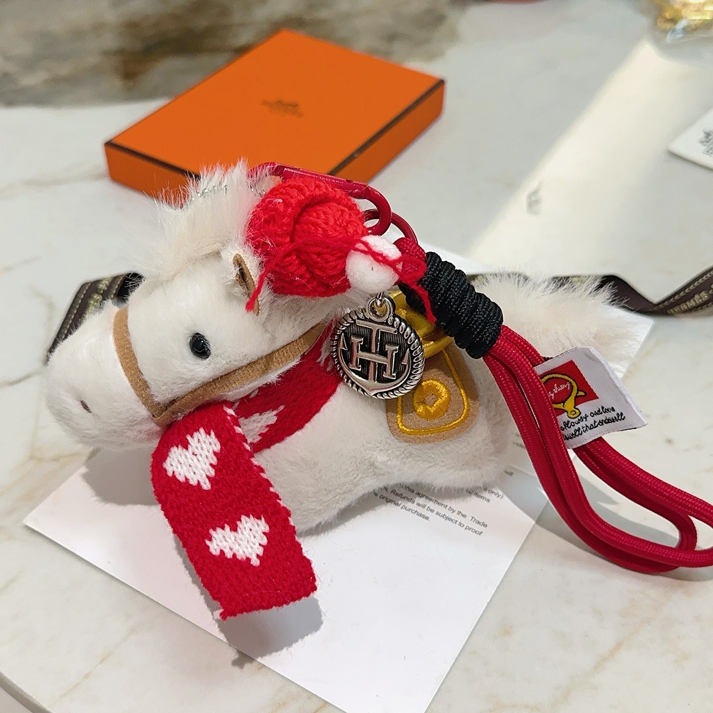Hermes Giddy Horse Charm pendant white plush red knit fabric antique silver-tone metal gold-tone metal tan fabric 12cm total strap length
