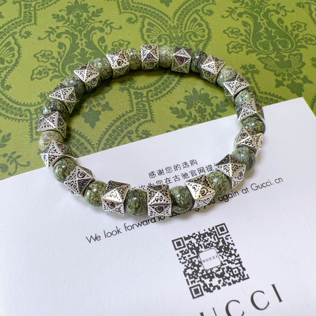 NO:705257,Batch. New product release Gucci bracelets for men and women. The latest natural stone Yaowang high-end material retro series bracelets are of a higher grade. The same style for celebrities. Anger Forest series double-g natural stone bracelets. Size: 16-24 cm. Details are distressed. Non-market glossy version. Non-market ordinary ones. This one has been out. Best-selling model in Gucci. Very good match with clothes, high-quality jewelry, gucci, bracelet.19860909批.新品发布古驰手链男女同款 最新款天然石药王高端材质复古件系列手链档次更高明星同款Anger Forest系列双g天然石手链 尺寸:16-24厘米 细节对版做旧处理 非市面亮面版型 非市面普通做这款一直在出 古驰里面热卖款 非常好搭配衣服,饰品精品,gucci,bracelet,Jewelry
