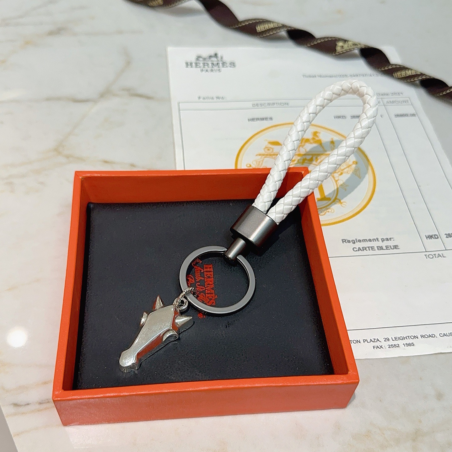Hermes Horse Head Braided Strap Keychain pendant White braided leather gunmetal gray hardware silver-tone horse head charm 10cm