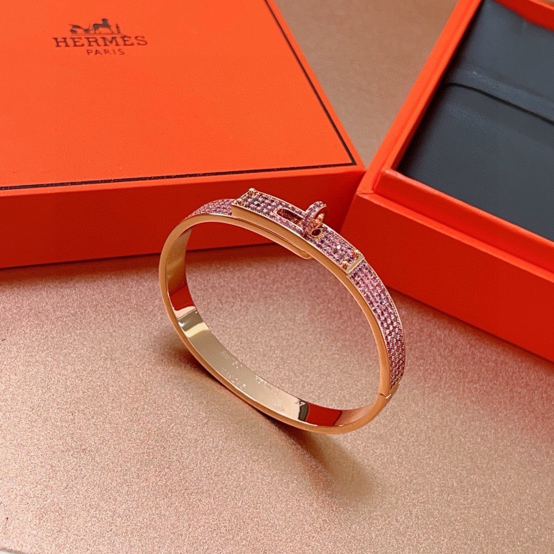 Hermes Kelly bracelet Rose gold metal with pink pave gemstones 17cm